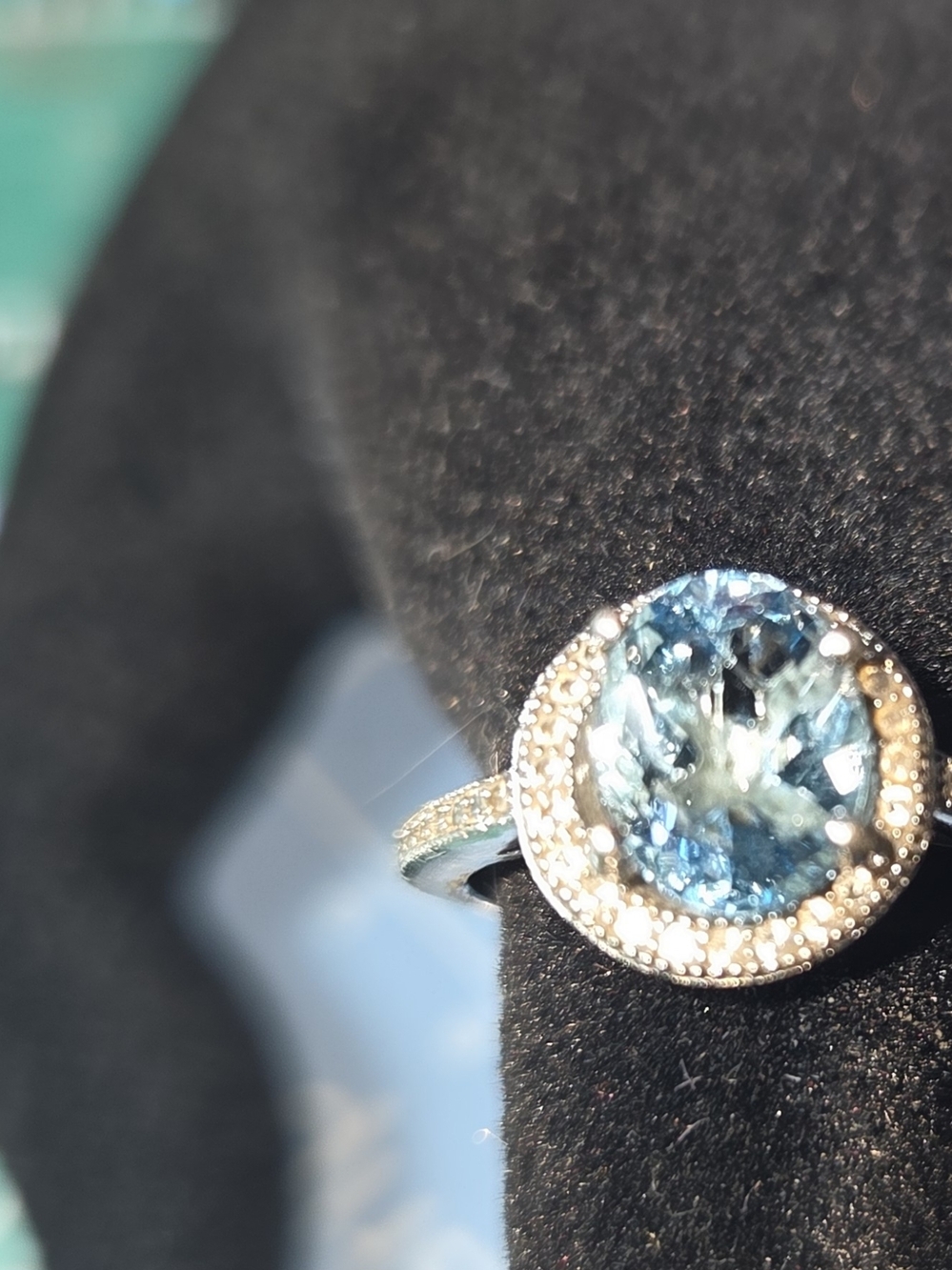 Sterling SilverBlue Topaz Halo Cocktail Ring Surrounded By CZ